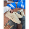 Adidas Superstar off e dourado