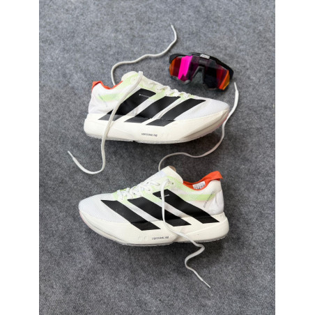 Adizero preto, laranja e verde
