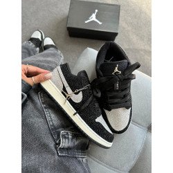 Jordan low preto e cinza pedraria